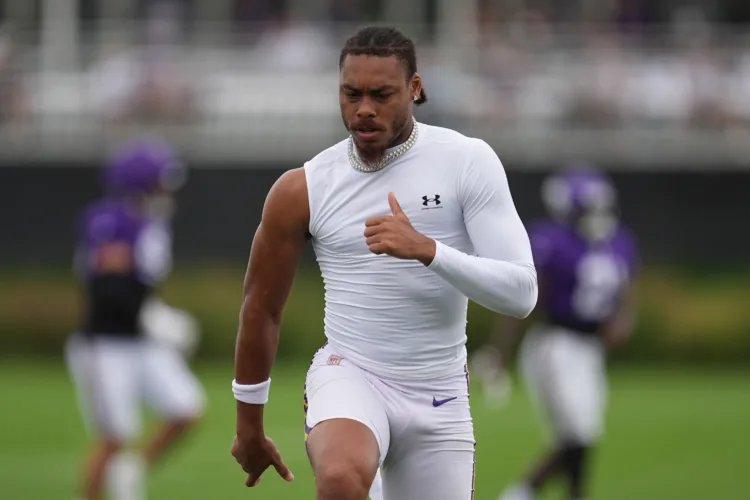 Vikings receivers savor tips from Randy Moss